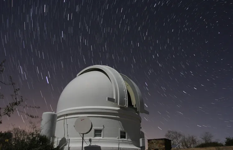 Star trails circle above the dome of the Palomar Observatory in San Diego County.